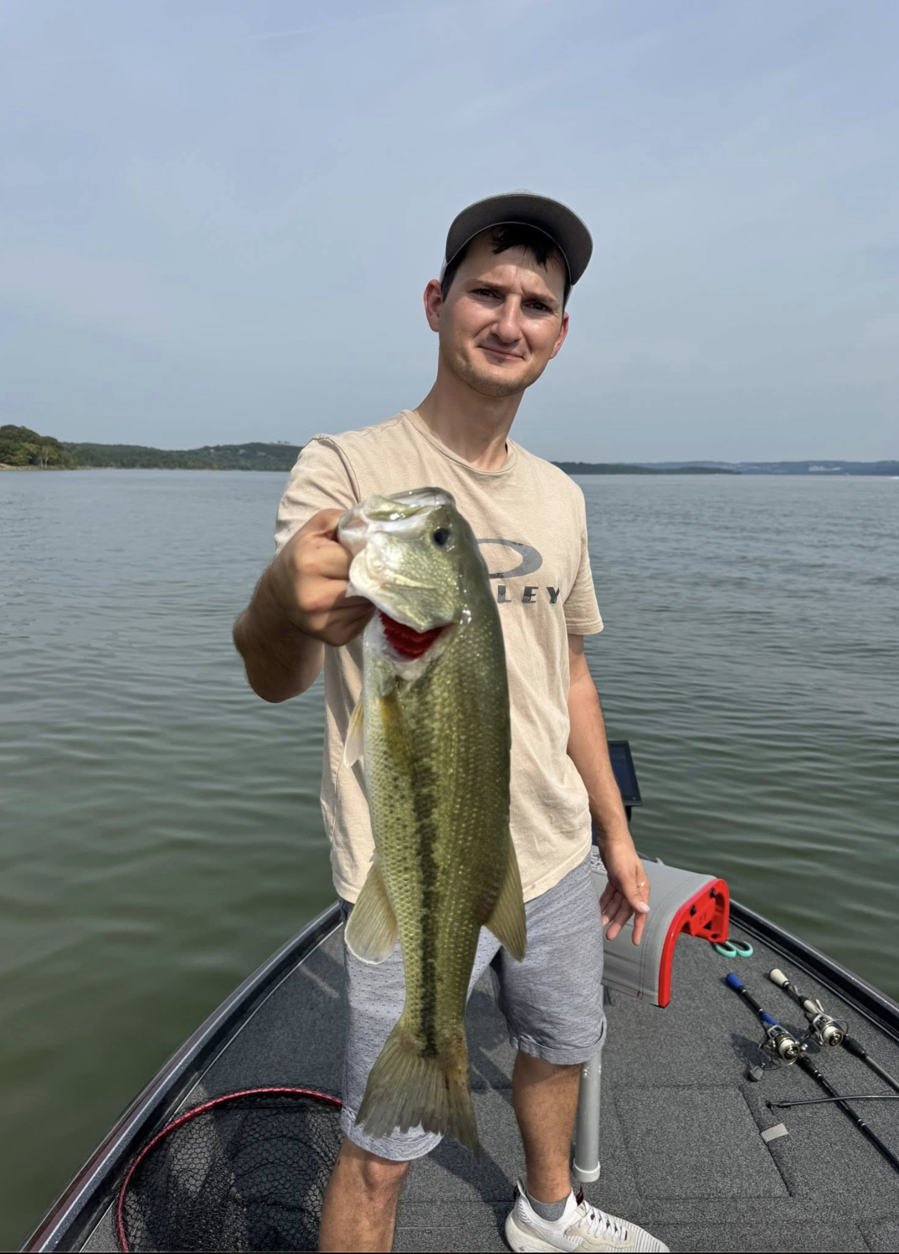 Angler with a smallmouth bass