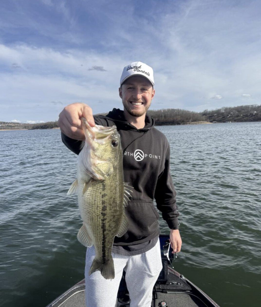 Angler with a largemouth bass on Table Rock Lake