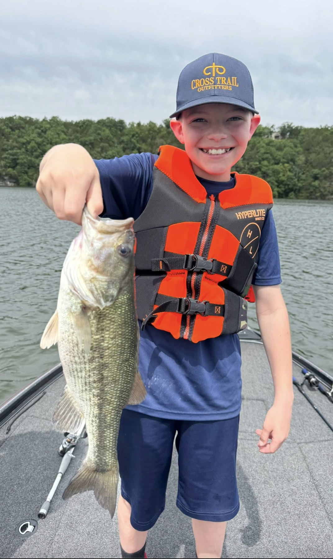 Young angler with his first bass